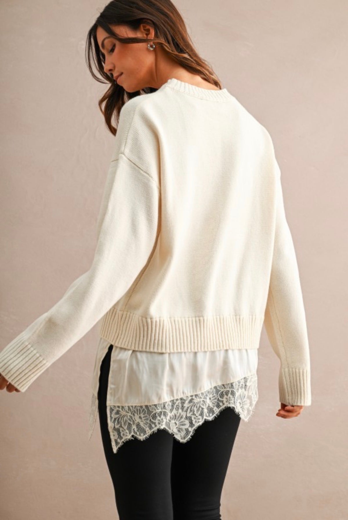 Cream knit sweater with lace layered hem