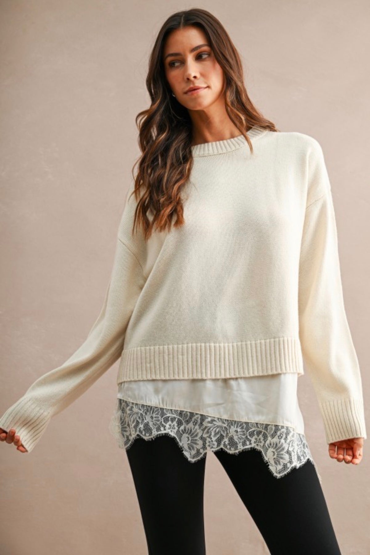 Cream knit sweater with lace layered hem