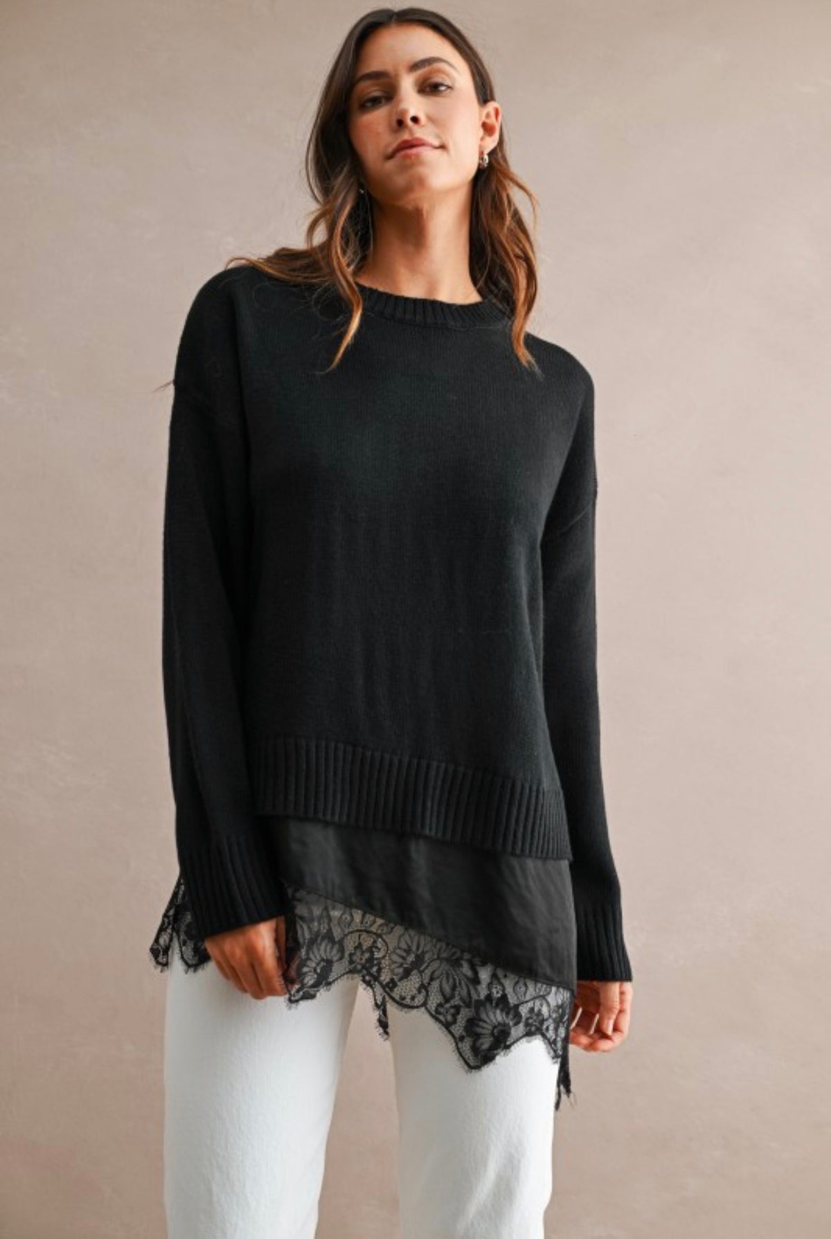 Black knit sweater with lace layered hem