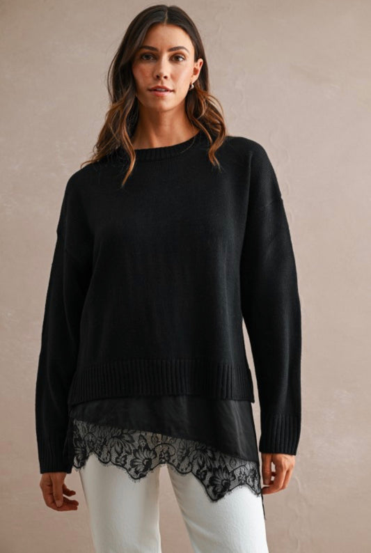 Black knit sweater with lace layered hem