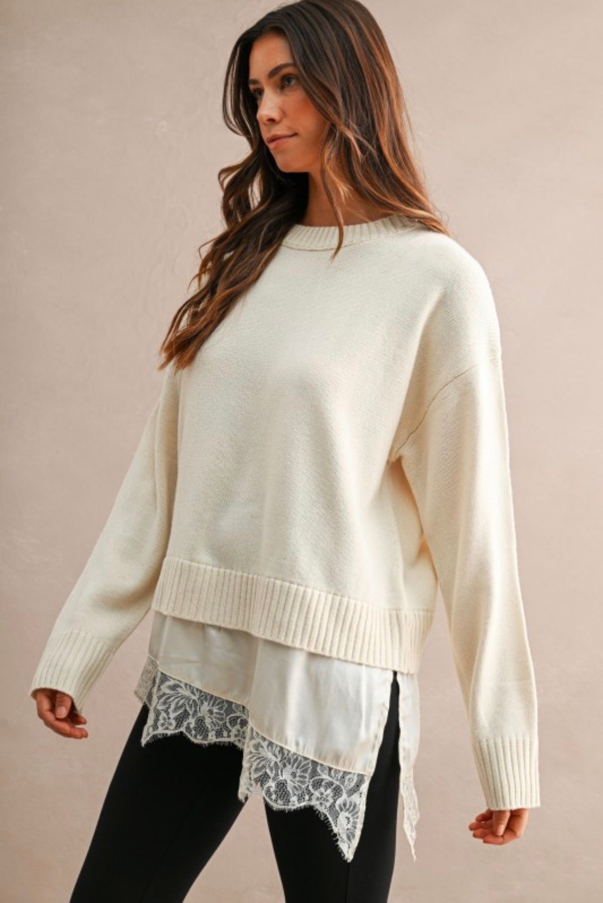 Cream knit sweater with lace layered hem